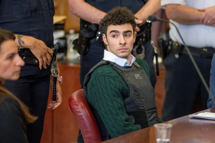 Prosecutors accuse Luigi Mangione’s lawyers of fanning publicity around him and call out hidden heart-shaped notes in socks